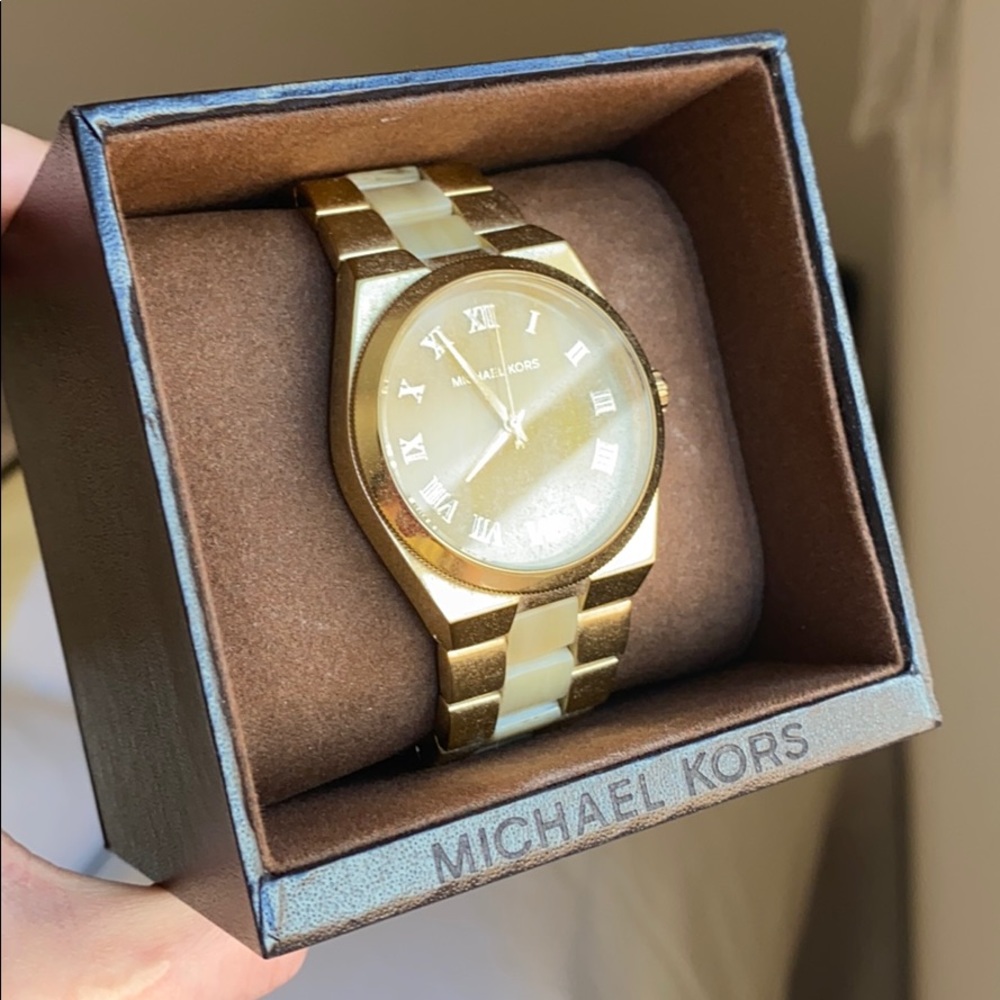 Michael Kors women’s gold watch